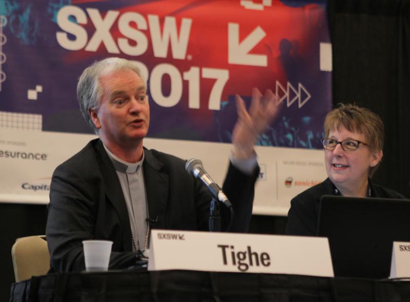 Irish Bishop Paul Tighe, adjunct secretary of the Pontifical Council for Culture, speaks March 10 during the South by Southwest Festival in Austin, Texas. At right is Helen Osman, a communication adviser. (CNS photo/Matt Palmer)